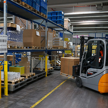 Forklift in the warehouse of the reference customer